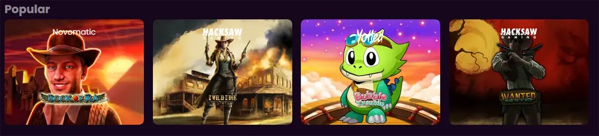 Popular games carousel on a purple background showing four slot thumbnails: Book of Ra Deluxe (Novomatic) with a smiling explorer in a hat at sunset, Wild Die (Hacksaw Gaming) with a gunslinger in front of a burning Western town, Bubble Trouble (VoltEnt) with a cute green cartoon dragon on a colorful stage, and Wanted Dead or a Wild (Hacksaw Gaming) featuring a masked outlaw against a yellow-orange backdrop.